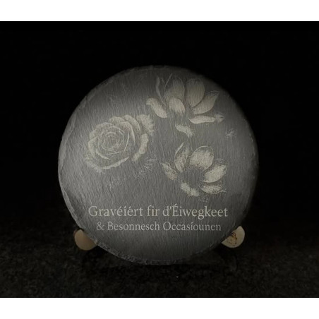 Remembrance or thanks with flowers on slate